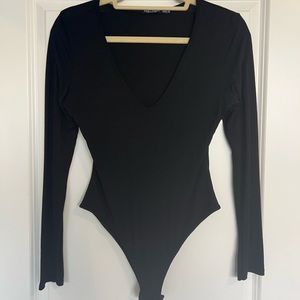 Black long sleeve body suit